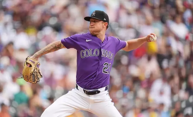 Colorado Rockies starting pitcher Kyle Freeland works against the Milwaukee Brewers in the fifth inning of a baseball game Sunday, June 7, 2026, in Denver. (AP Photo/David Zalubowski)