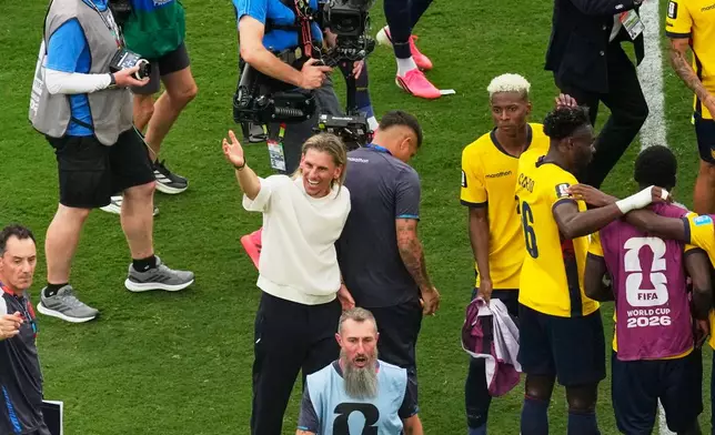 Ecuador head coach Sebastian Beccacece celebrates their victory over Germany during the World Cup Group E soccer match in East Rutherford, N.J., near New York, Thursday, June 25, 2026. (AP Photo/Seth Wenig)