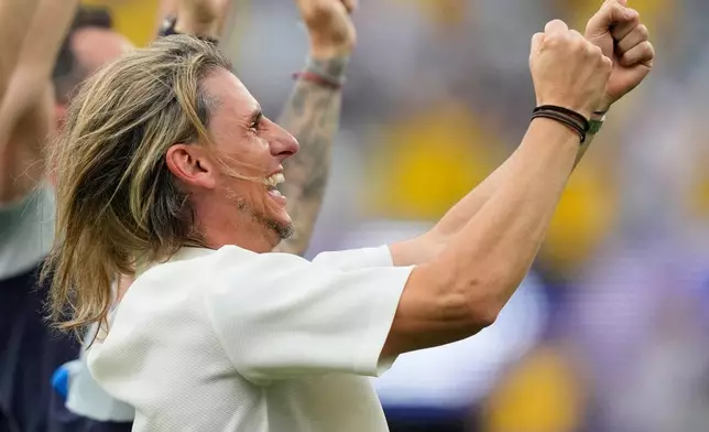Ecuador head coach Sebastian Beccacece celebrates after the World Cup Group E soccer match against Germany in East Rutherford, N.J., near New York, Thursday, June 25, 2026. (AP Photo/Yuki Iwamura)