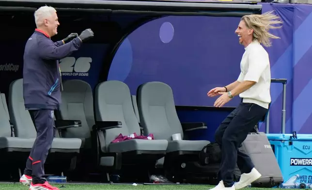 Ecuador head coach Sebastian Beccacece, right, celebrates after during the World Cup Group E soccer match between Ecuador and Germany in East Rutherford, N.J., near New York, Thursday, June 25, 2026. (AP Photo/Steve Luciano)