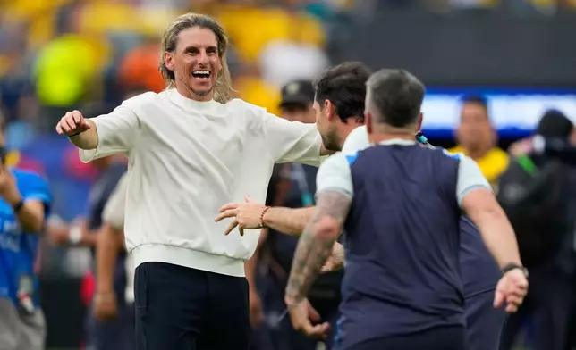 Ecuador head coach Sebastian Beccacece celebrates after the World Cup Group E soccer match against Germany in East Rutherford, N.J., near New York, Thursday, June 25, 2026. (AP Photo/Yuki Iwamura)