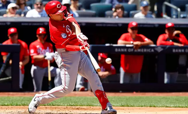 Cincinnati Reds' Sal Stewart hits an RBI double during the third inning of a baseball game against the New York Yankees, Saturday, June 20, 2026, in New York. (AP Photo/Noah K. Murray)