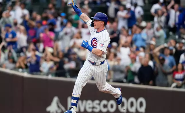Chicago Cubs' Pete Crow-Armstrong celebrates as he rounds the bases after hitting a solo home run during the first inning of a baseball game against the Colorado Rockies in Chicago, Tuesday, June 16, 2026. (AP Photo/Nam Y. Huh)