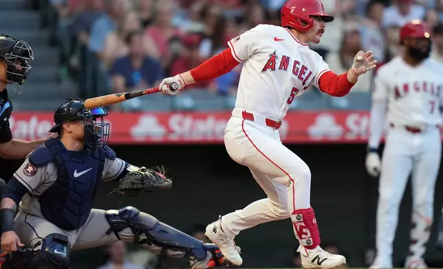 Los Angeles Angels Wade Meckler (53) watches his 2-run double against the Houston Astros during the second inning of a baseball game Tuesday, June 9, 2026, in Anaheim, Calif. (AP Photo/Scott Strazzante)