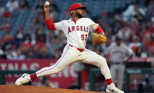 Los Angeles Angels pitcher Walbert Urena (57) delivers against the Houston Astros during the fourth inning in a baseball game Tuesday, June 9, 2026, in Anaheim, Calif. (AP Photo/Scott Strazzante)