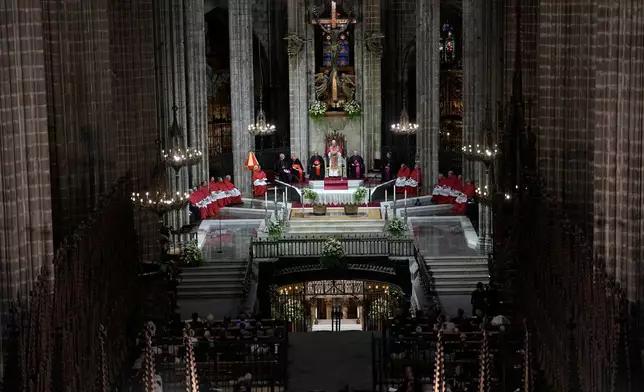 Pope Leo XIV presides over the midday prayer in the Cathedral of the Holy Cross and Saint Eulalia in Bacelona, Spain, Tuesday, June 9, 2026, on the fourth day of a seven-day apostolic journey to mainland Spain and the Canary Islands. (AP Photo/Alessandra Tarantino)
