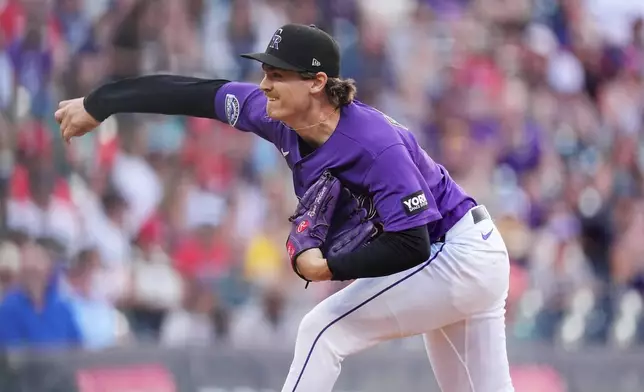Colorado Rockies starting pitcher Ryan Feltner works against the Boston Red Sox in the first inning of a baseball game Monday, June 22, 2026, in Denver. (AP Photo/David Zalubowski)