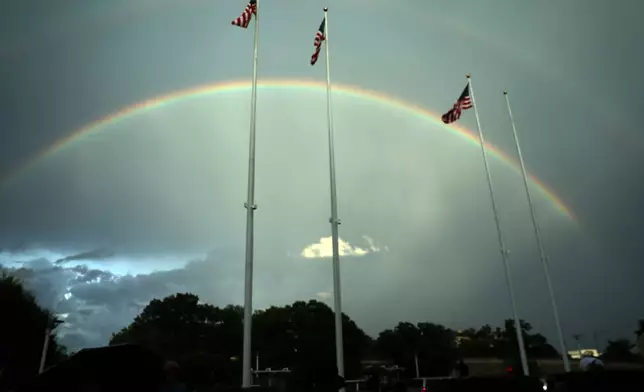 A double rainbow is seen from the John F. Kennedy Center for the Performing Arts in Washington, Friday, June 12, 2026. (AP Photo/Rahmat Gul)