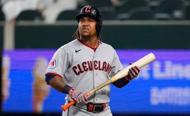 Cleveland Guardians' José Ramírez walks to the dugout after lining out to short in the eighth inning of a baseball game against the Texas Rangers in Arlington, Texas, Sunday, June 7, 2026. (AP Photo/Tony Gutierrez)