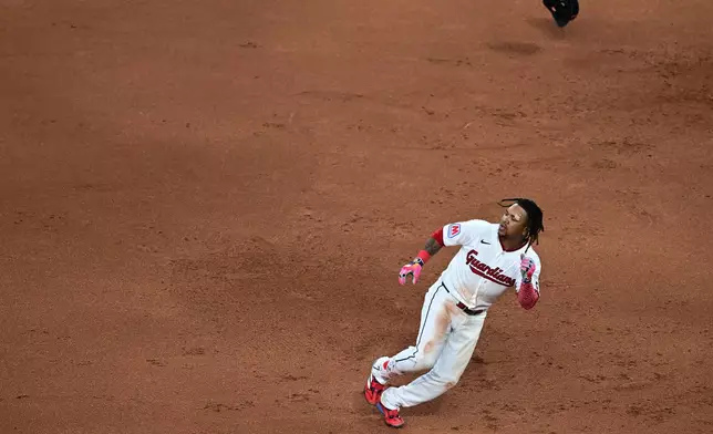 Cleveland Guardians' Jose Ramirez rounds first base after hitting a single during the sixth inning of a baseball game against the New York Yankees, Tuesday, June 9, 2026, in Cleveland. (AP Photo/David Dermer)
