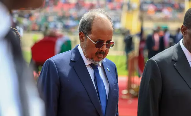 FILE -Somalia's President Hassan Sheikh Mohamud pays his respects at a state funeral for former Kenya Prime Minister Raila Odinga at Nyayo National Stadium in Nairobi, Kenya, Oct. 17, 2025. (AP Photo/Andrew Kasuku, File)