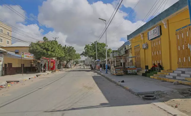 An empty street with closed shops is seen after supporters of opposition political figures and state security forces clashed in Mogadishu, Somalia, Thursday, June 4, 2026. (AP Photo/Farah Abdi Warsameh)