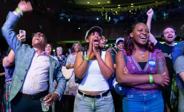 Supporters celebrate after D.C. Council member Janeese Lewis George won the D.C. Mayor primary election during an election night party at the Howard Theatre, Tuesday, June 16, 2026, in Washington. (AP Photo/Jose Luis Magana)