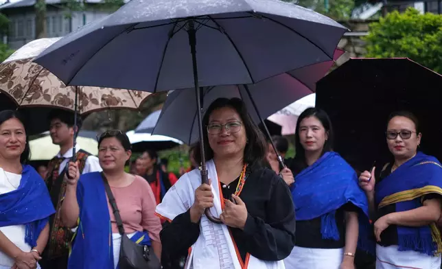 Vizhula nyusou, 47, participates in a protest against rising cases of sexual violence against women and demanding justice for victims, in Kohima, capital of the northeastern Indian state of Nagaland, Friday, June 19, 2026. (AP Photo/Yirmiyan Arthur)
