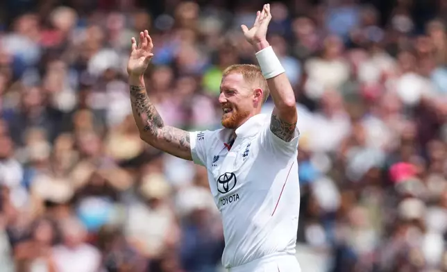 England's captain Ben Stokes celebrates the dismissal of New Zealand's Devon Conway during the fourth day of the Test match between England and New Zealand at Lord's cricket ground in London, Sunday, June 7, 2026. (AP Photo/Kirsty Wigglesworth)
