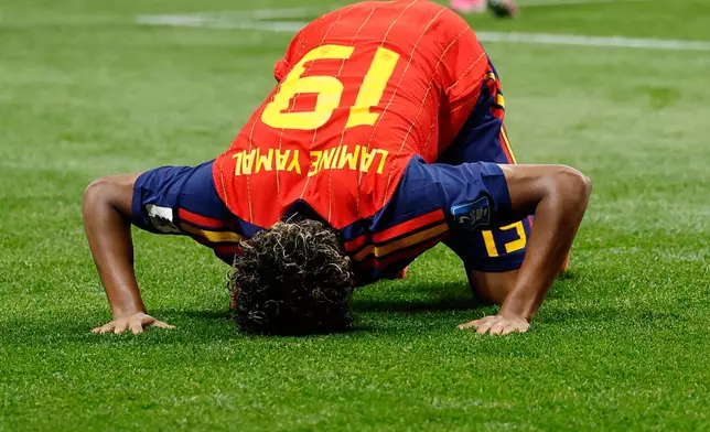 Spain's Lamine Yamal celebrates after scoring his side's opening goal during the World Cup Group H soccer match between Spain and Saudi Arabia in Atlanta, Sunday, June 21, 2026. (AP Photo/Erik S.Lesser)