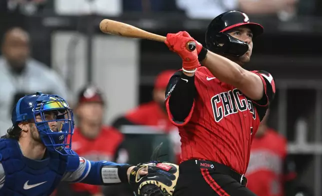 Chicago White Sox's Jacob Gonzalez watches his three-run home during the third inning of a baseball game against the Kansas City Royals in Chicago, Friday, June 26, 2026. (AP Photo/Paul Beaty)