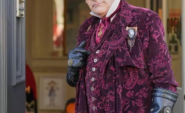 Steampunk NZ Festival attendee Ross McKay, dressed as his steampunk persona, Captain Roscoe Dangerfield, Inspector of Nuisances to Her Majesty Queen Victoria III, poses during the annual event in Ōamaru, New Zealand, Friday, May 29, 2026. (AP Photo/Charlotte Graham-McLay)