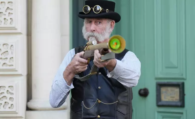 Steampunk NZ Festival attendee Darrell Jeffries stands for a photo during the annual event in Ōamaru, New Zealand, Friday, May 29, 2026. (AP Photo/Charlotte Graham-McLay)