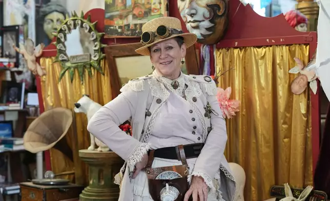 Steampunk NZ Festival chair Lea Campbell, dressed as her steampunk persona Dusty Traveller, poses for a portrait during the annual event in Ōamaru, New Zealand, Friday, May 29, 2026. (AP Photo/Charlotte Graham-McLay)