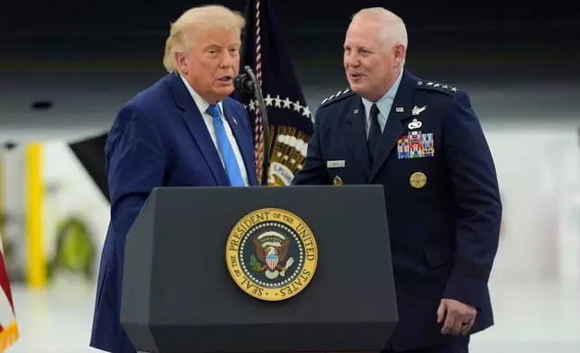 President Donald Trump, left, speaks alongside Air Force Gen. Dale White after touring the newly designated Air Force One presidential aircraft at Joint Base Andrews, Md., Friday, June 19, 2026. (AP Photo/Manuel Balce Ceneta)