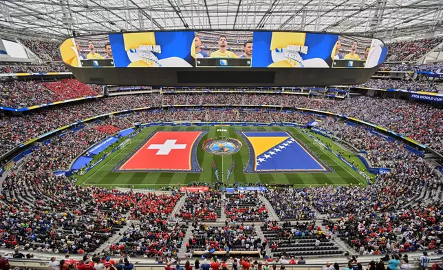 Swiss and Bosnian glags are seen on the pitch before the World Cup Group B soccer match between Switzerland and Bosnia in Inglewood, Calif., near Los Angeles, Thursday, June 18, 2026. (AP Photo/Jayne Kamin-Oncea)