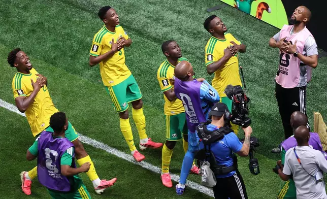 South African players celebrate after a goal during the World Cup Group A soccer match between Czechia and South Africa in Atlanta, Thursday, June 18, 2026. (AP Photo/Colin Hubbard)