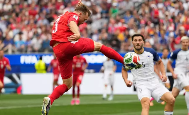Switzerland's Silvan Widmer attempts a shot on goal during the World Cup Group B soccer match between Switzerland and Bosnia in Inglewood, Calif., near Los Angeles, Thursday, June 18, 2026. (AP Photo/Andre Penner)