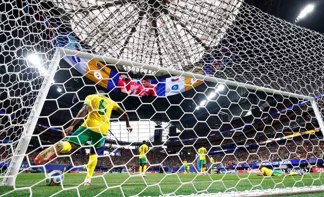 South Africa's Aubrey Modiba retrieves the ball from the net after Czechia's Michal Sadilek scored during the World Cup Group A soccer match between Czechia and South Africa in Atlanta, Thursday, June 18, 2026. (AP Photo/Erik S. Lesser)