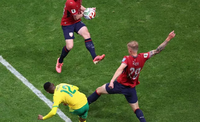 Ball hits Czechia's Pavel Sulc (15) in the hand causing a penalty call during the World Cup Group A soccer match between Czechia and South Africa in Atlanta, Thursday, June 18, 2026. (AP Photo/Colin Hubbard)