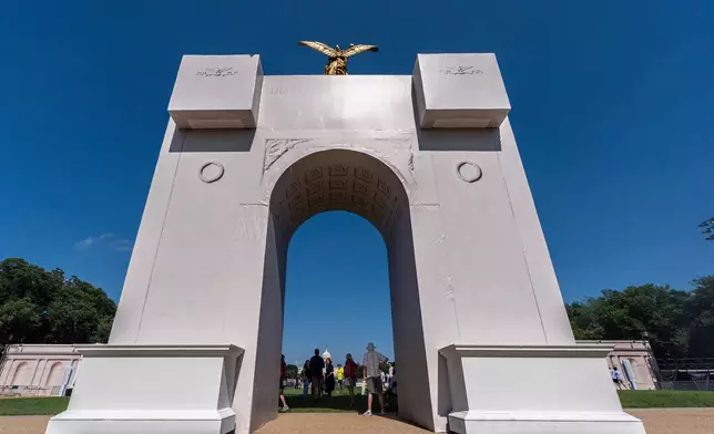 A mockup of President Donald Trump's proposed Triumphal Arch stands at the Great American State Fair on the National Mall, Monday, June 29, 2026, in Washington. (AP Photo/Jen Golbeck)