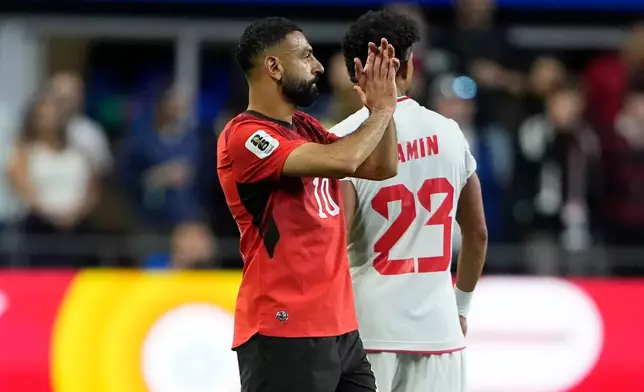 Egypt's Mohamed Salah (10) reacts as he leaves the field to be substituted during the World Cup Group G soccer match between Egypt and Iran in Seattle, Friday, June 26, 2026. (AP Photo/Lindsey Wasson)