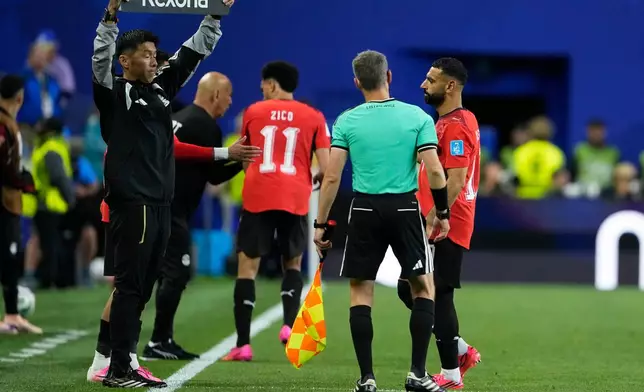 Egypt's Mohamed Salah (10), right, leaves the field during the World Cup Group G soccer match between Egypt and Iran in Seattle, Friday, June 26, 2026. (AP Photo/Lindsey Wasson)
