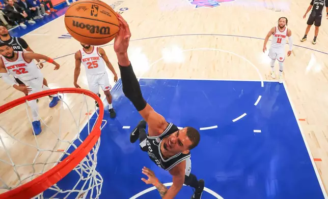 San Antonio Spurs forward Victor Wembanyama shoots against the New York Knicks during the first half of Game 4 of the NBA Finals basketball series, Monday, June 8, 2026, in New York. (Al Bello/Pool Photo via AP)