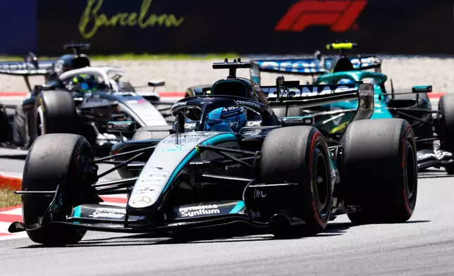 Mercedes driver George Russell of Britain steers his car during the third free practice for the Spain F1 Grand Prix at the Barcelona Catalunya racetrack in Montmelo, near Barcelona, Spain, Saturday, June 13, 2026. (AP Photo/Joan Monfort)