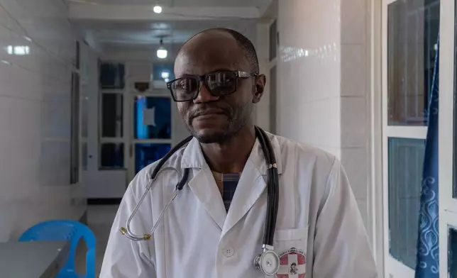 Dr Jean Marc Shimbi, Medical Director of the Marie Claire Vandekerckhove Clinic, poses for a photo in Bunia, Congo, Friday, June 12, 2026. (AP Photo/Moses Sawasawa)