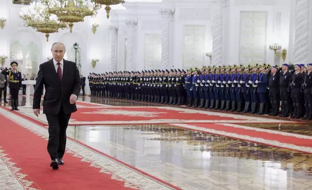 Russian President Vladimir Putin attends a ceremony to present the Order of Zhukov to the Presidential Regiment of the Russian Federal Guard Service at the Kremlin's St. George Hall in Moscow, Tuesday, June 23, 2026. (Gavriil Grigorov/Sputnik, Kremlin Pool Photo via AP)