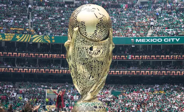 Fher Olvera, lead singer of Mexican pop rock band Mana performs before the start of the World Cup Group A soccer match between Mexico and South Africa in Mexico City, Thursday, June 11, 2026. (AP Photo/Natacha Pisarenko)