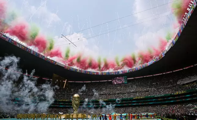 Fireworks go off above the stadium during the opening ceremony before the start of the World Cup Group A soccer match between Mexico and South Africa in Mexico City, Thursday, June 11, 2026. (AP Photo/Natacha Pisarenko)