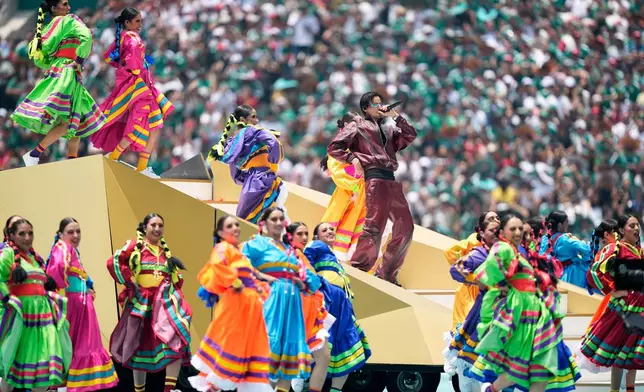 Colombian singer J Balvin performs before the start of the World Cup Group A soccer match between Mexico and South Africa in Mexico City, Thursday, June 11, 2026. (AP Photo/Natacha Pisarenko)