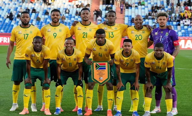 FILE - South Africa players pose for a team photo before the Africa Cup of Nations group B soccer match between Angola and South Africa in Marrakech, Morocco, Monday, Dec. 22, 2025. (AP Photo/Themba Hadebe, File)