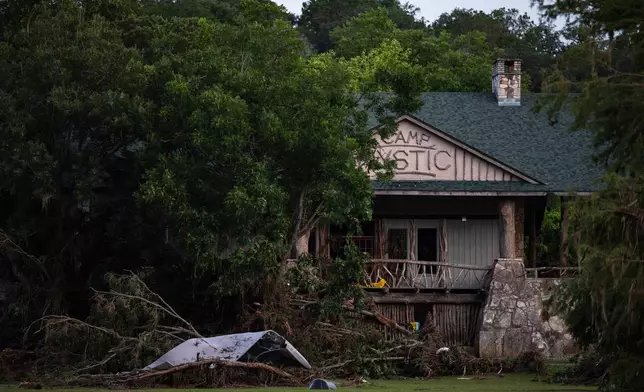 FILE-Debris covers the area of Camp Mystic in Hunt, Texas, Monday, July 7, 2025, after a flash flood swept through the area. (AP Photo/Eli Hartman, File)