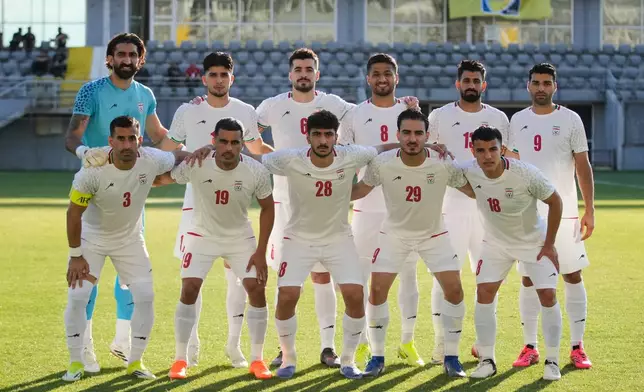 Iran's players pose for photographers prior to a friendly soccer match between Iran and Gambia, in Antalya, southern Turkey, Friday, May 29, 2026. (AP Photo/Khalil Hamra)
