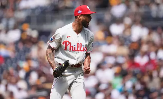 Philadelphia Phillies starting pitcher Cristopher Sánchez celebrates after the last out of the seventh inning of a baseball game against the San Diego Padres Wednesday, May 27, 2026, in San Diego. (AP Photo/Gregory Bull)