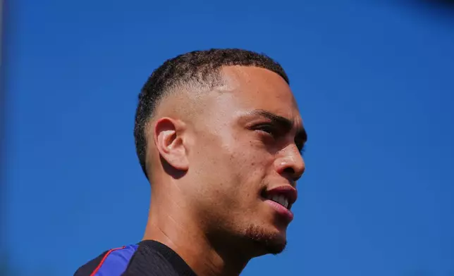 United States' Sergino Dest addresses the media during a training session ahead of the team's World Cup Group D soccer match against Australia in Seattle, Thursday, June 18, 2026. (AP Photo/Manu Fernandez)