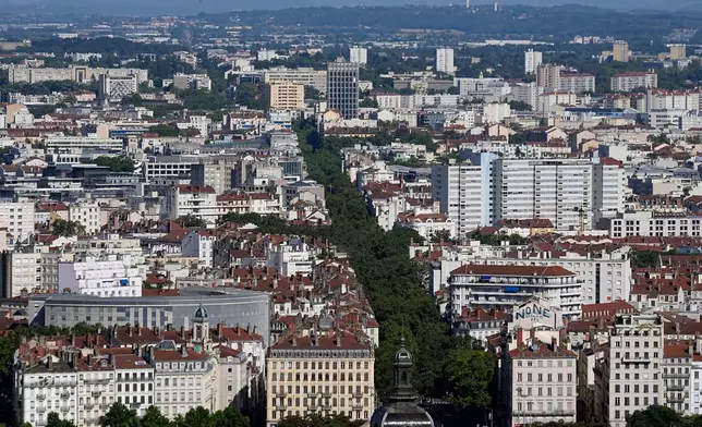 The city of Lyon, central France, is seen during a heat wave, Saturday, June 27, 2026. (AP Photo/Laurent Cipriani)