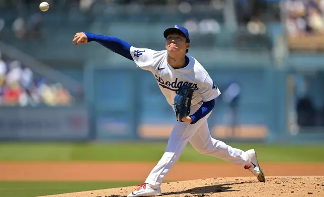 Los Angeles Dodgers pitcher Yoshinobu Yamamoto delivers to the plate during the second inning of a baseball game against the Philadelphia Phillies, Sunday, May 31, 2026, in Los Angeles. (AP Photo/Jayne Kamin-Oncea)