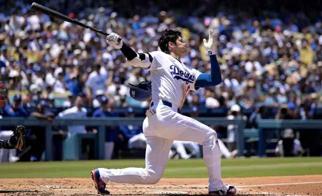 Los Angeles Dodgers' Shohei Ohtani strikes out during the second inning of a baseball game against the Philadelphia Phillies, Sunday, May 31, 2026, in Los Angeles. (AP Photo/Jayne Kamin-Oncea)