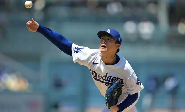 Los Angeles Dodgers pitcher Yoshinobu Yamamoto delivers to the plate during the second inning of a baseball game against the Philadelphia Phillies, Sunday, May 31, 2026, in Los Angeles. (AP Photo/Jayne Kamin-Oncea)