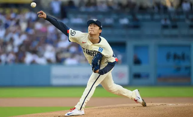 Los Angeles Dodgers starting pitcher Yoshinobu Yamamoto delivers during the first inning of a baseball game against the Los Angeles Angels in Los Angeles, Saturday, June 6, 2026. (AP Photo/Kyusung Gong)